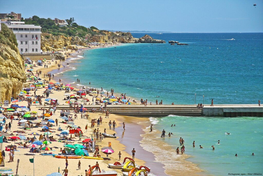 busy beach in the Algarve